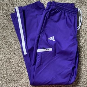 Adidas Purple windbreaker/track pants w/ zip bottoms.